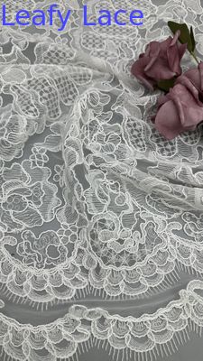 手作りのフローラル刺繍、レースに施された芸術的なディテール、チュールメッシュ生地、ウェディングドレス用