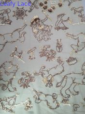 シャンペン色のスパンコールの刺繍された生地の女の子の服のレースの網のスパンコール