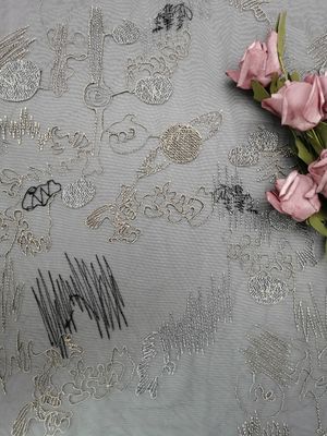 Ecoの友好的で幾何学的なライン着色された刺繍の生地