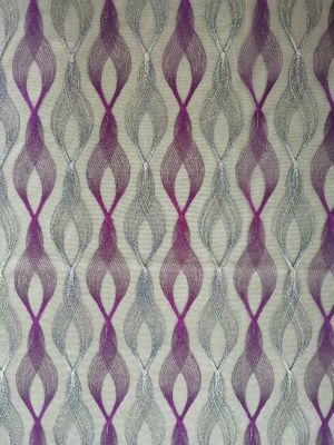 家の織物の紫色の幾何学的な着色された刺繍の生地