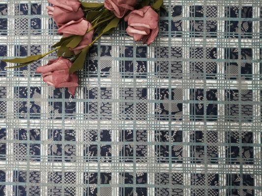 党によって着色される花の印刷されたレースの生地のイブニング・ドレスの生地